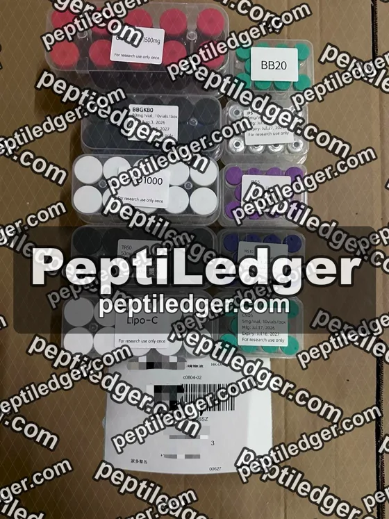 Boxes of vials with lid labels on a cardboard surface
