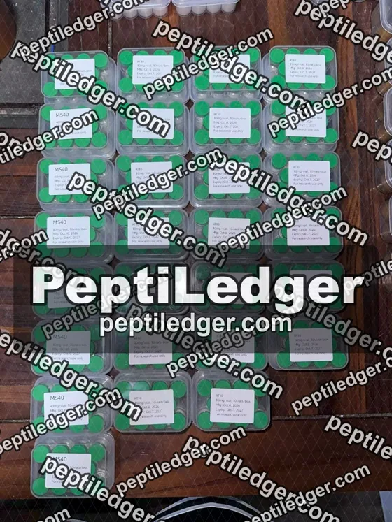 Boxes of green-capped vials with lid labels