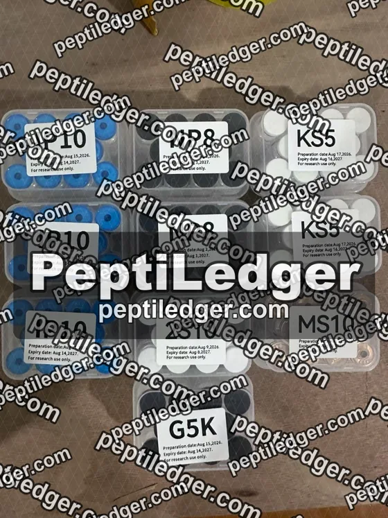 Boxes of vials with product-code lid labels in a carton